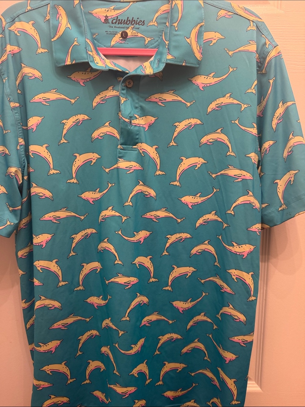 chubbies Teal Polo with Yellow and Pink Dolphin Print